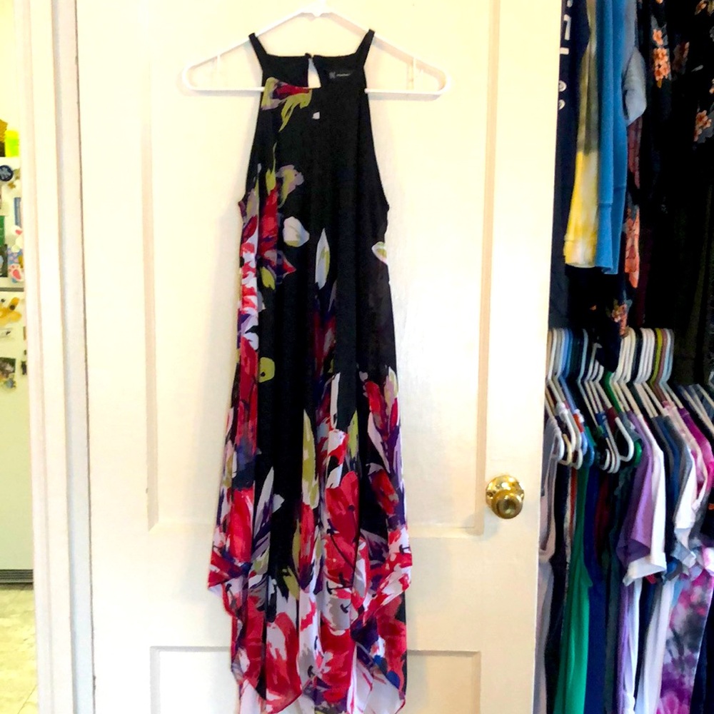 Like new high neck handkerchief hem dress with beautiful floral print.
